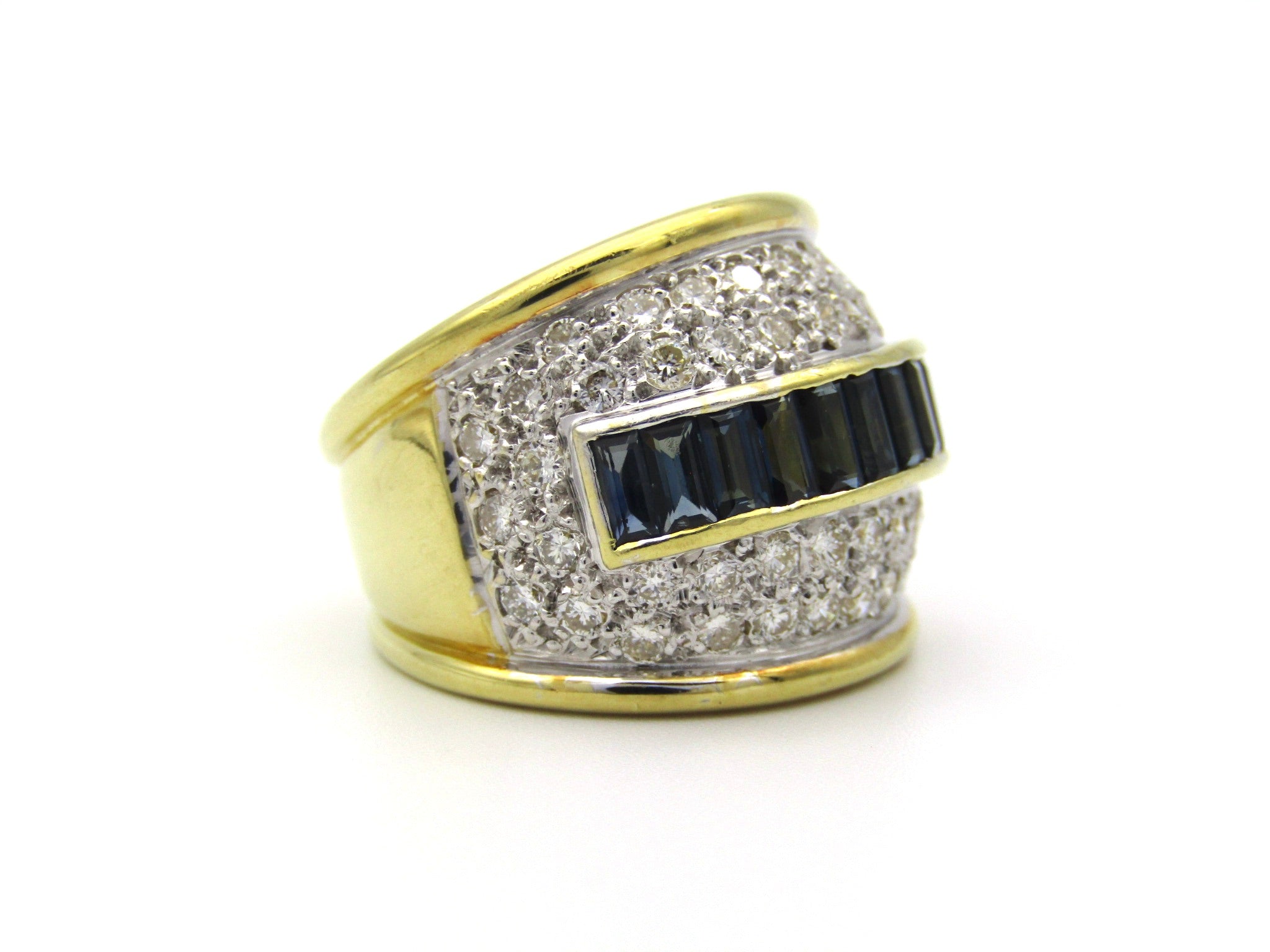 18K gold sapphire and diamond dress ring.