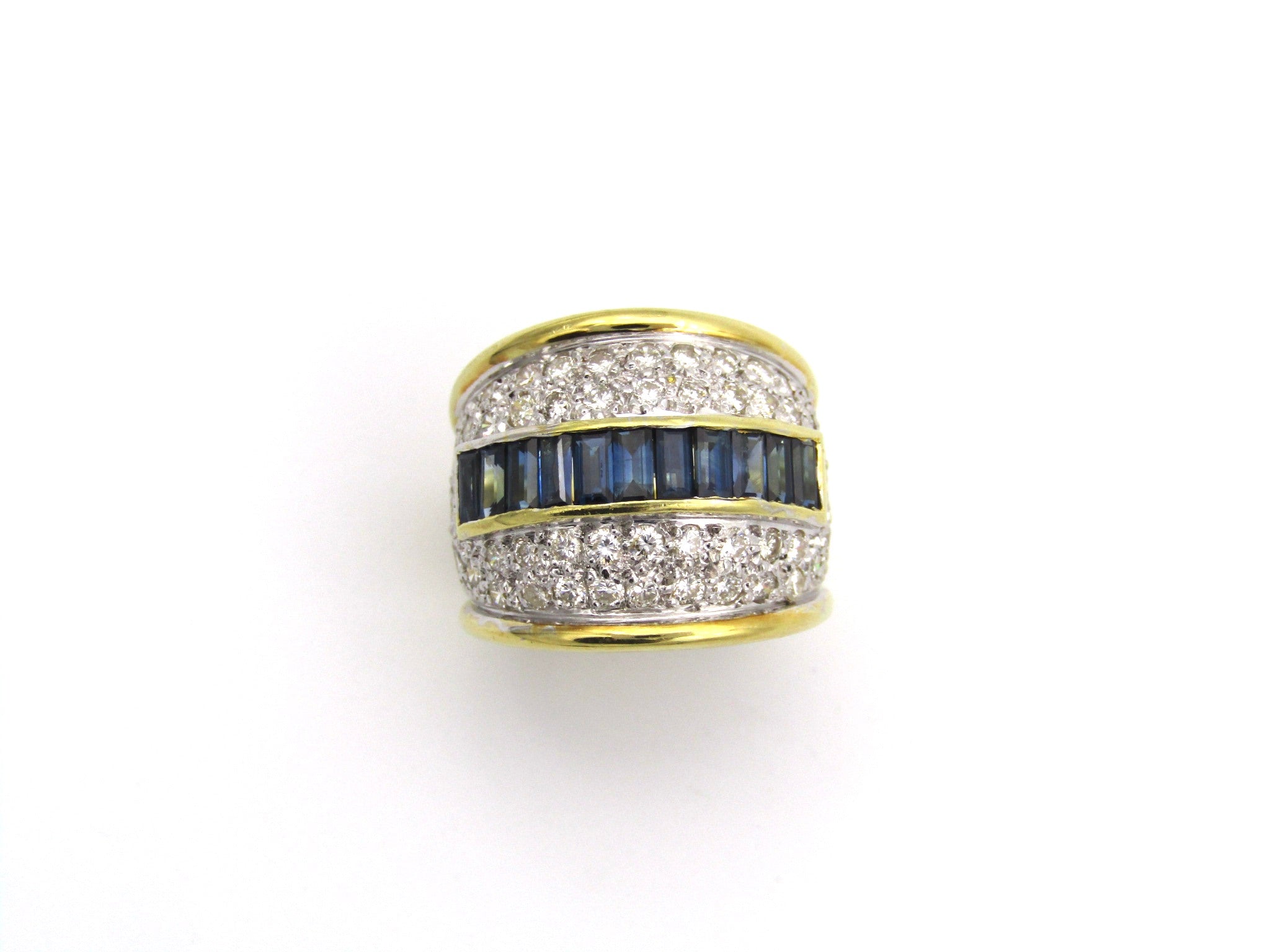 18K gold sapphire and diamond dress ring.