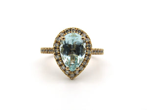 18K gold aquamarine, diamond, and sapphire ring.