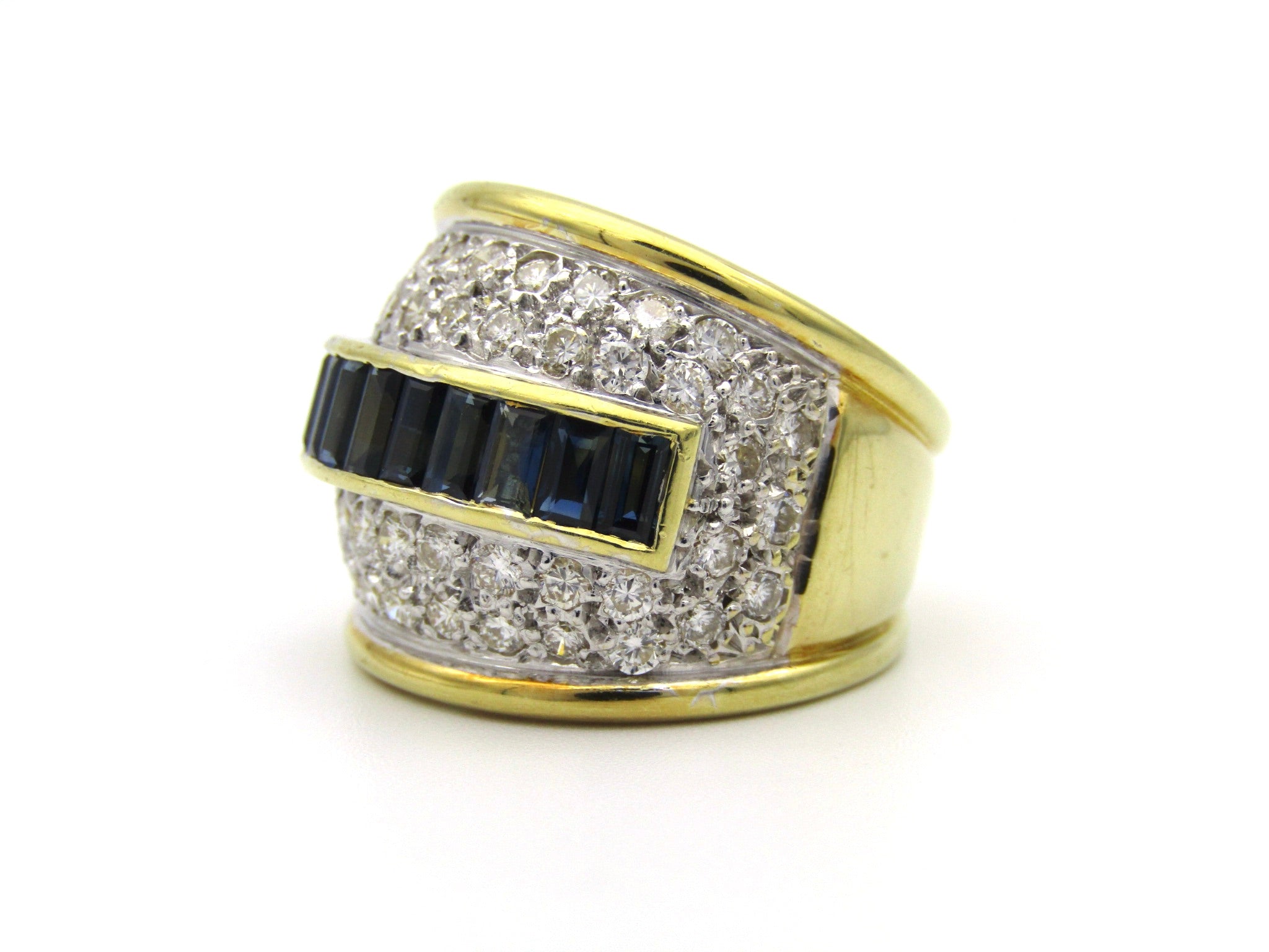 18K gold sapphire and diamond dress ring.