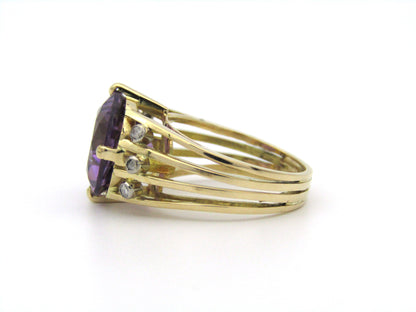 18K gold amethyst and diamond ring.