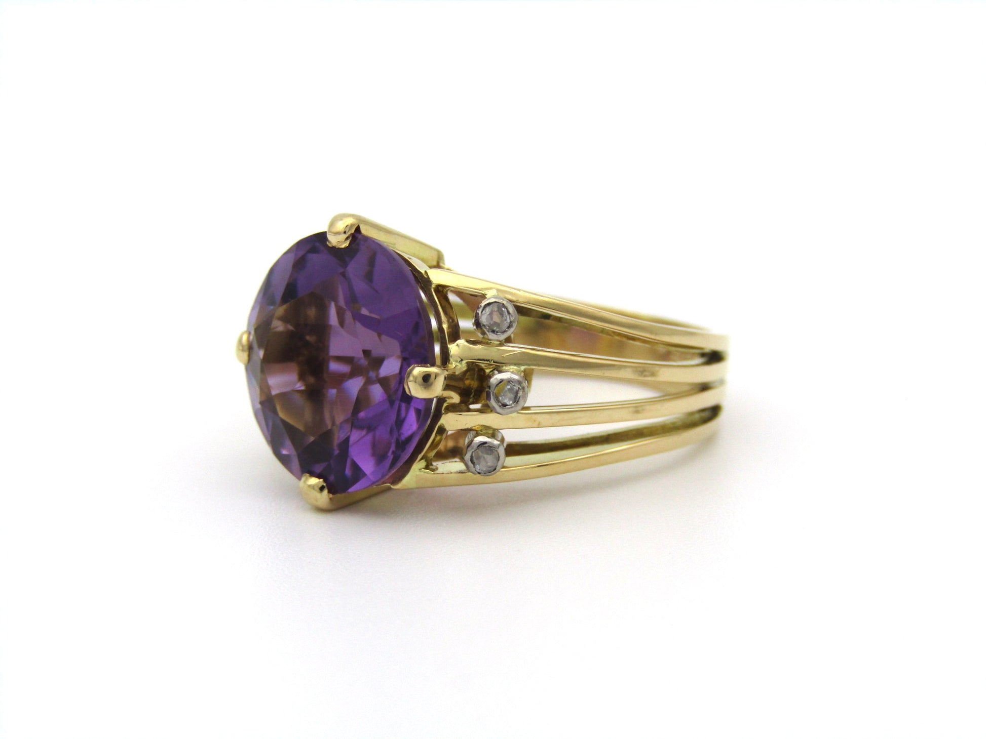 18K gold amethyst and diamond ring.