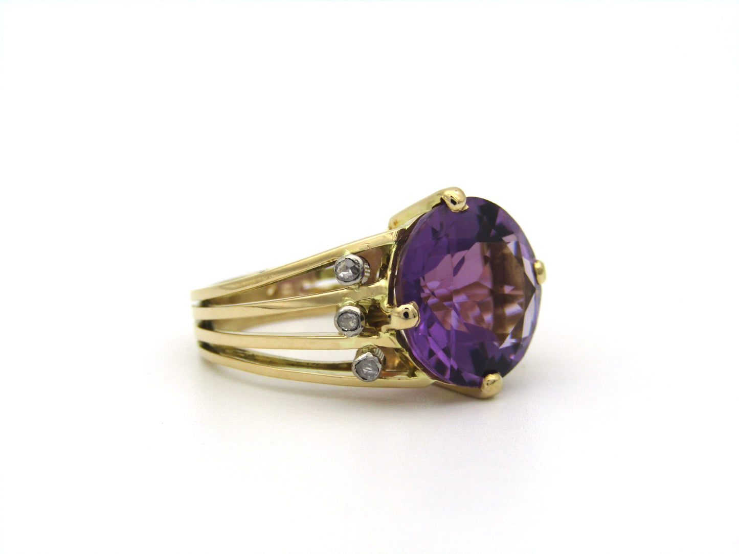 18K gold amethyst and diamond ring.