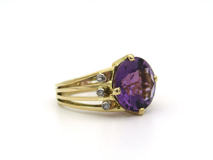 18K gold amethyst and diamond ring.