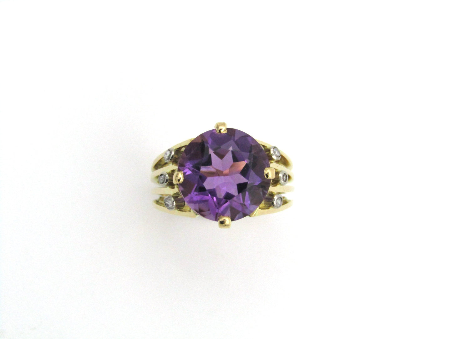 18K gold amethyst and diamond ring.