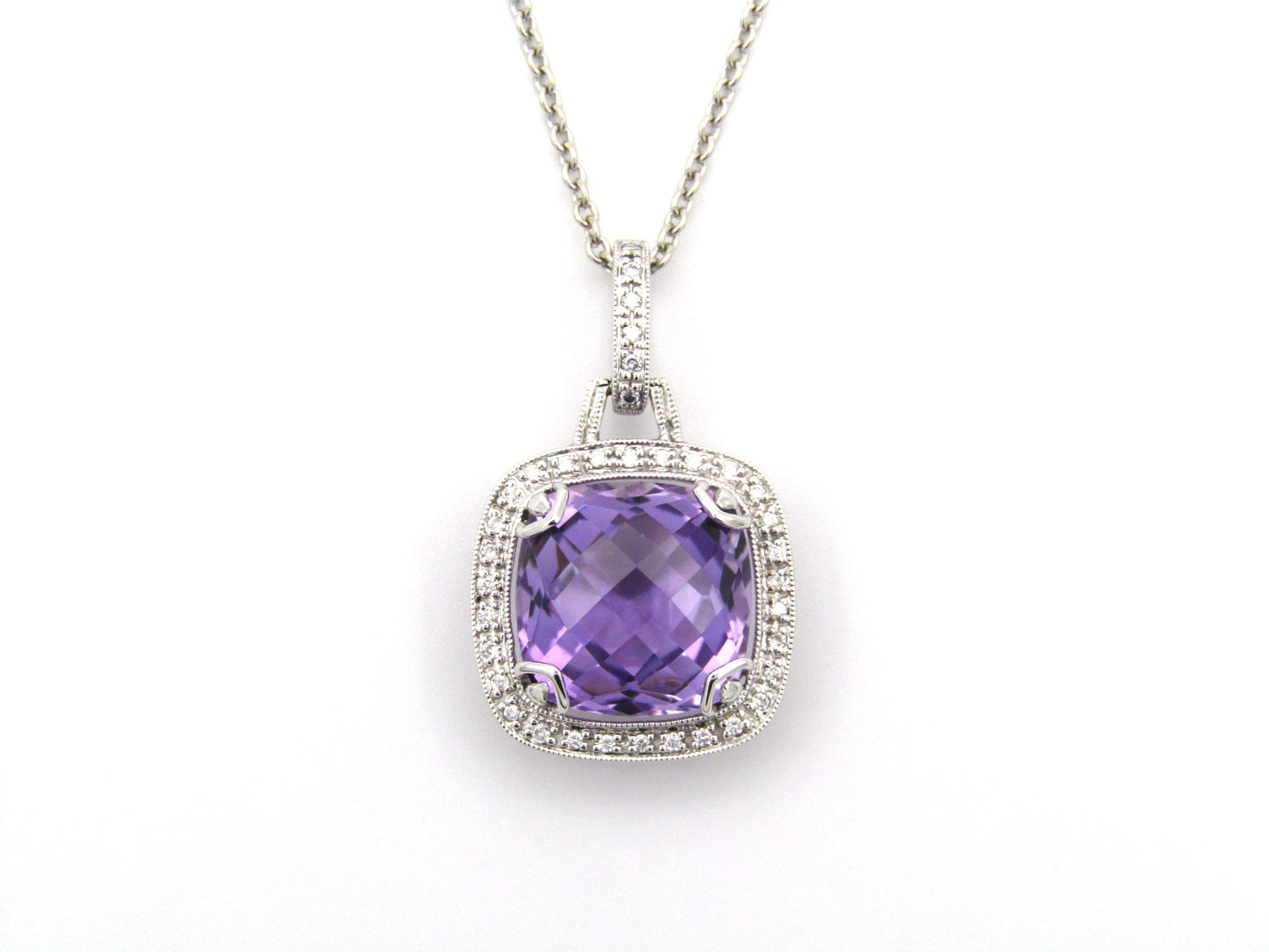 9K gold amethyst and diamond pendant by Browns.