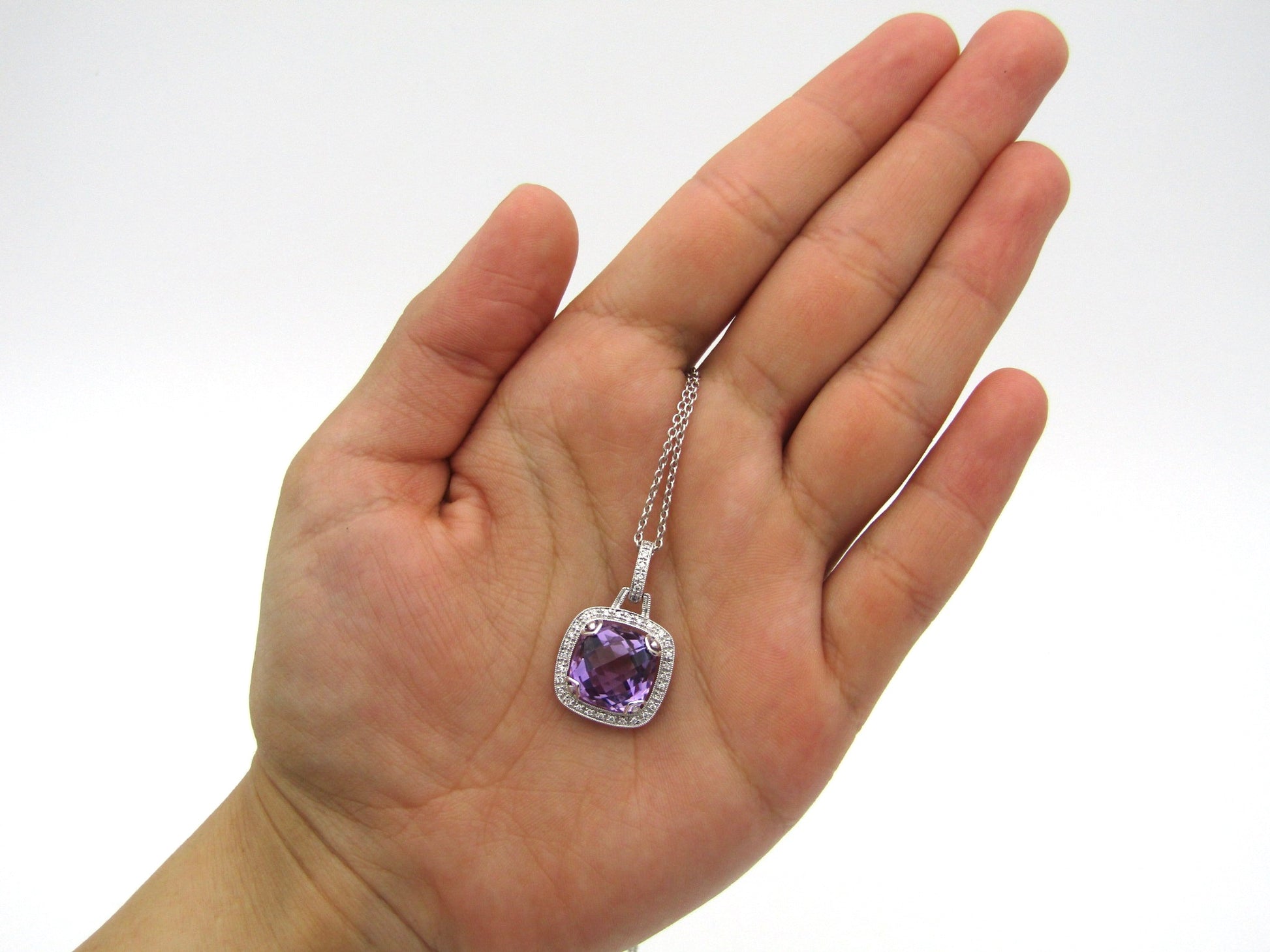 9K gold amethyst and diamond pendant by Browns.