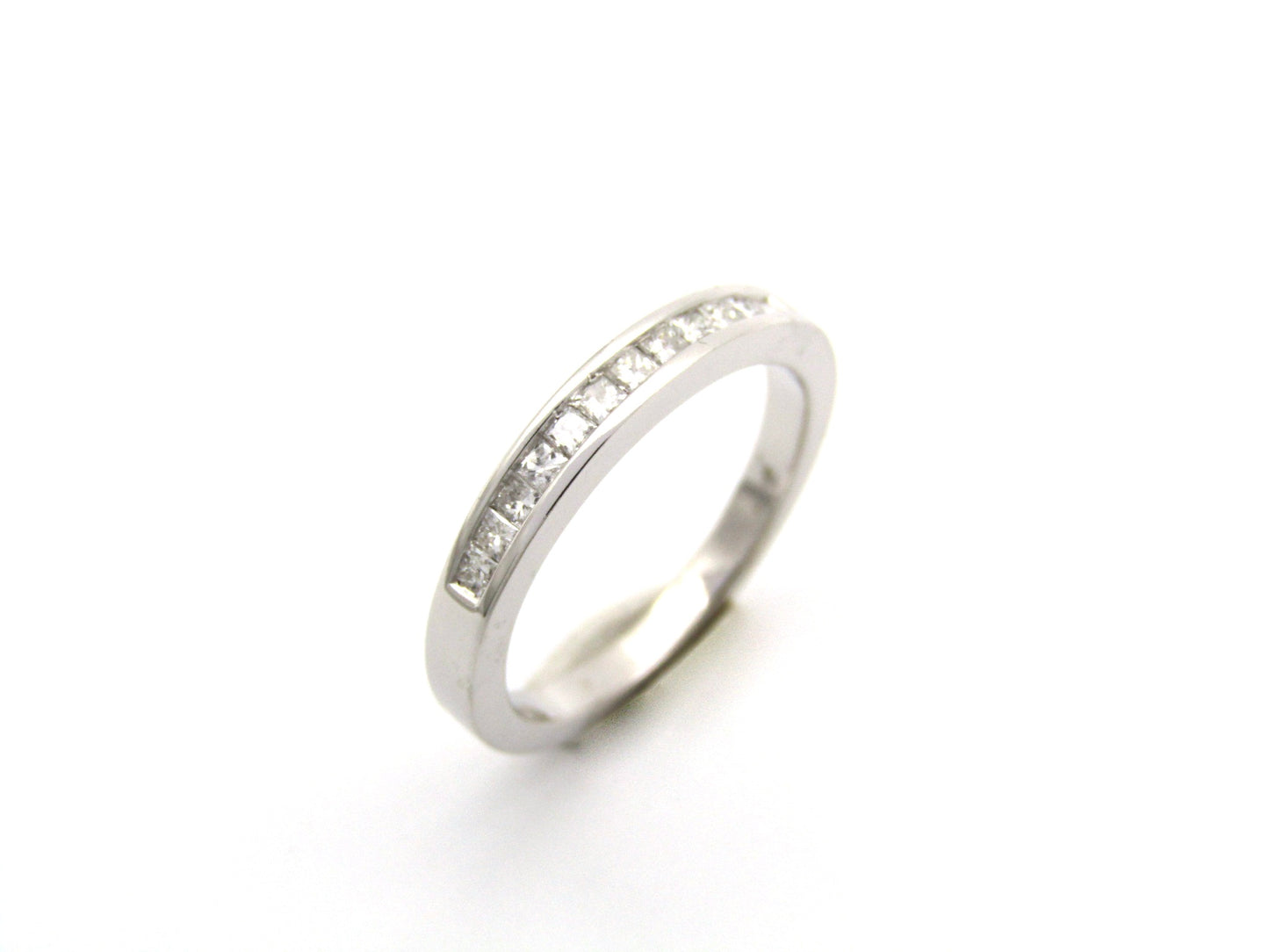 18K gold half eternity-diamond ring.