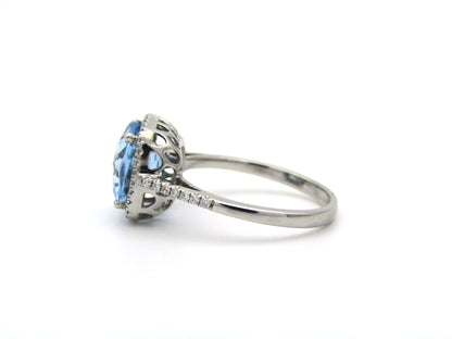 14K gold blue topaz and diamond ring by Browns.