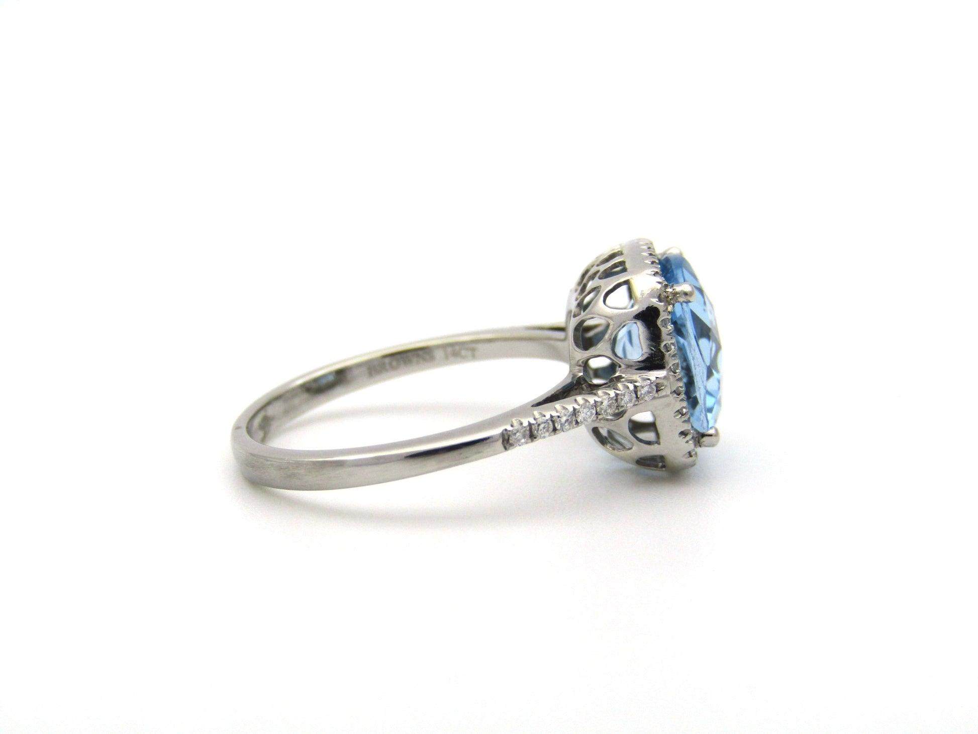 14K gold blue topaz and diamond ring by Browns.