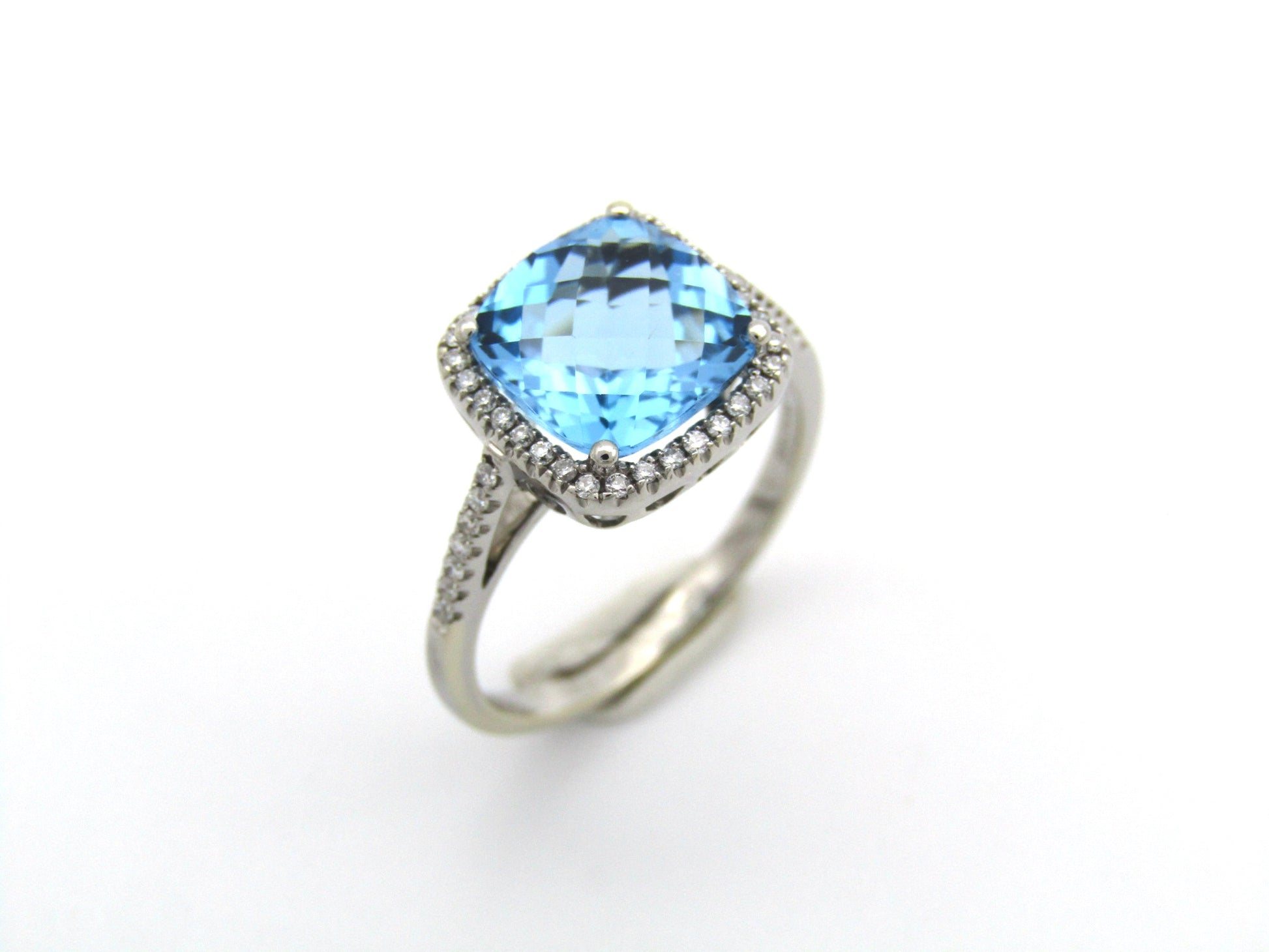 14K gold blue topaz and diamond ring by Browns.